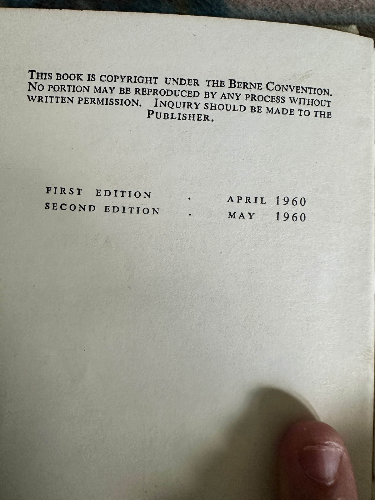 Inner page of the 1960 Animals of East Africa book showing first and second edition publication dates