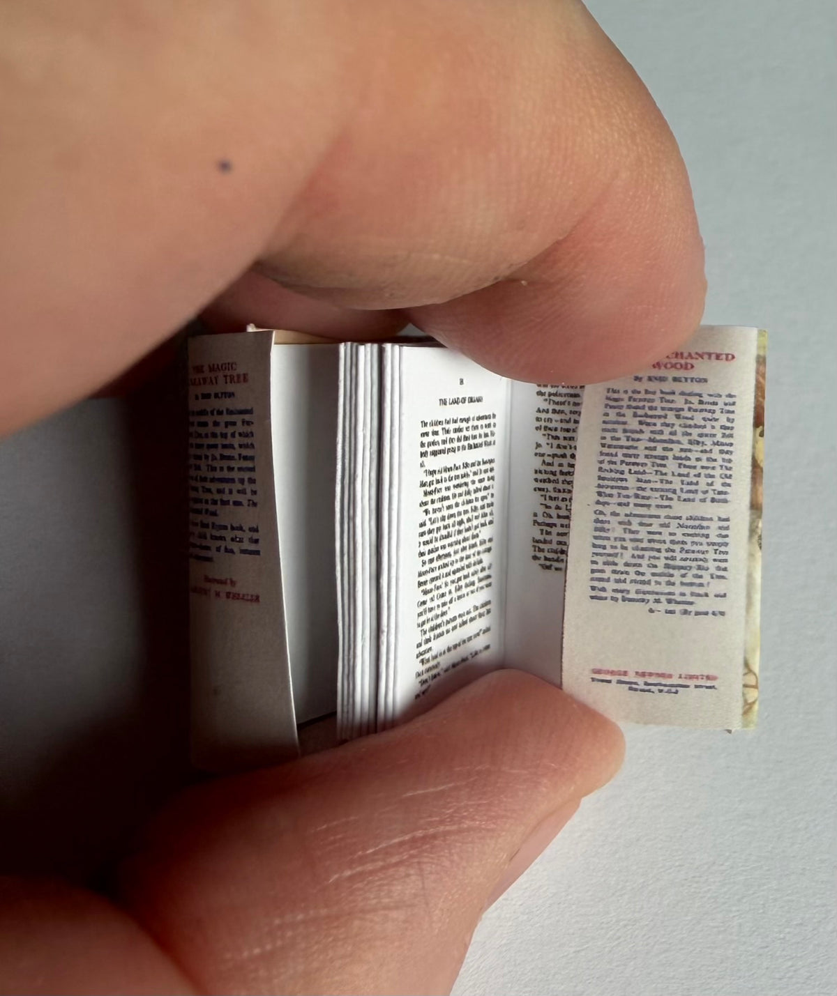 The Magic Faraway Tree 1:12 scale 2x3 detachable dust jacket opening book. Not full books, not suitable for children