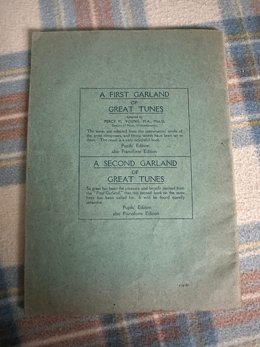 A First Garland of Great Tunes Percy M Young, cover of antiquarian book in blue-green color