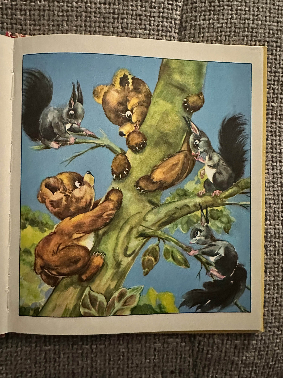 Illustration from Corrie Scherewitz rare kids book showing bears and squirrels in a playful tree scene