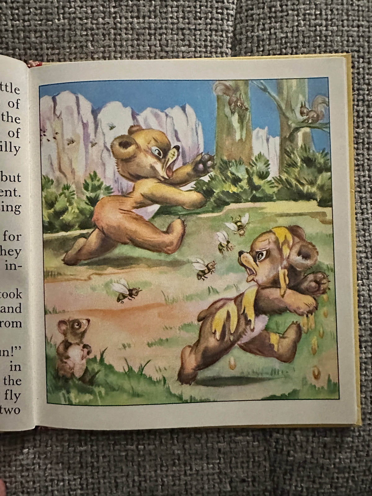 Illustration from Corrie Scherewitz rare kids book featuring playful bear cubs in a vibrant nature scene