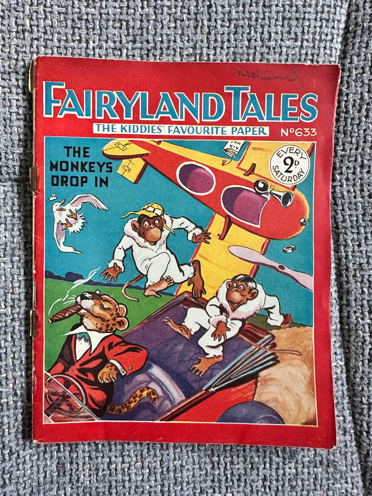 1934 Fairyland Tales vintage children's book cover featuring colorful illustrations of monkeys in playful scenes