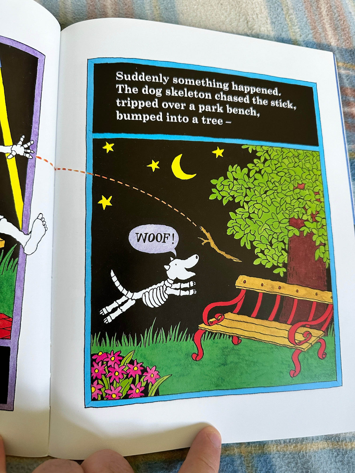Page from Funnybones Janet and Allan Ahlberg book featuring a dog skeleton chasing a stick at night