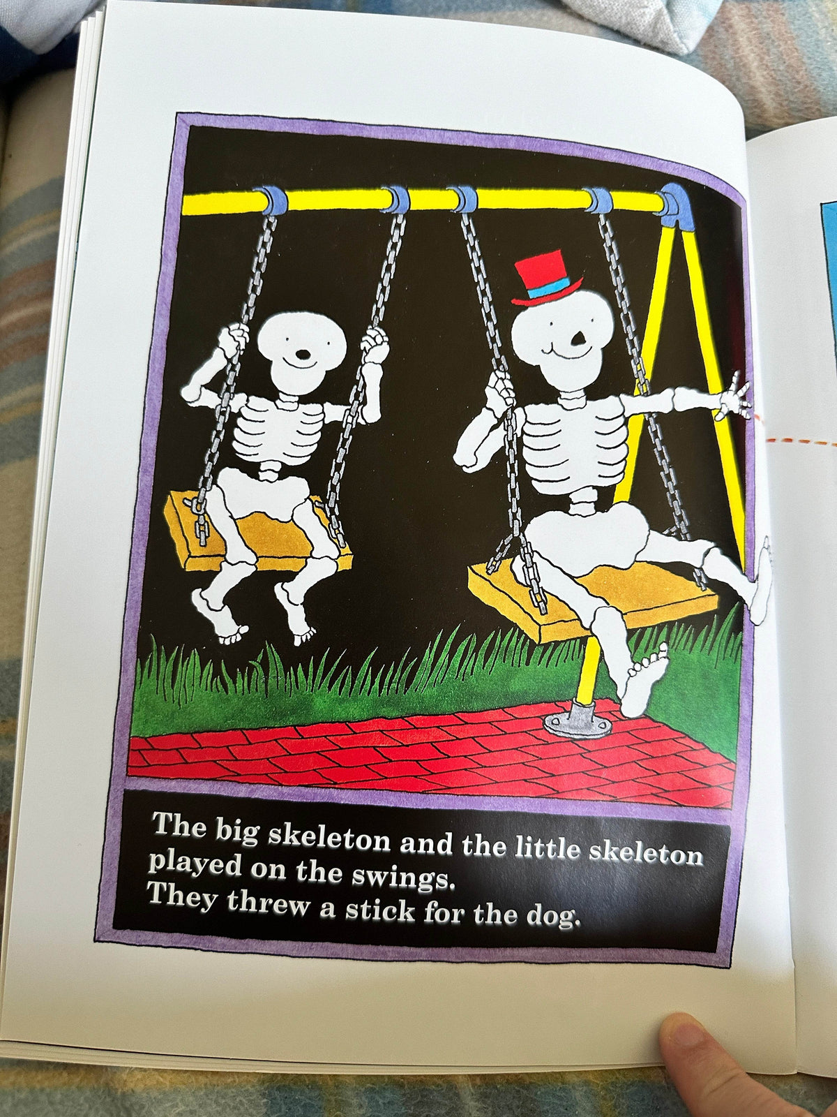 Funnybones Janet and Allan Ahlberg book illustration of skeletons on swings playing outdoors
