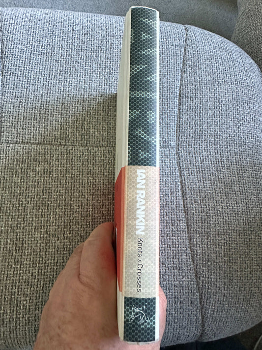 Spine view of Knots and Crosses collectors edition for sale by Honeyburn Books with unique design