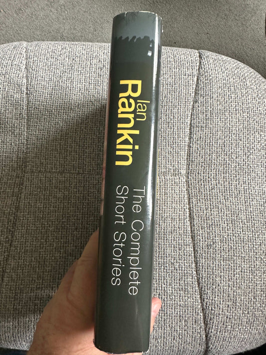 Ian Rankin The Complete Short Stories book spine showcasing the title and author on a grey background