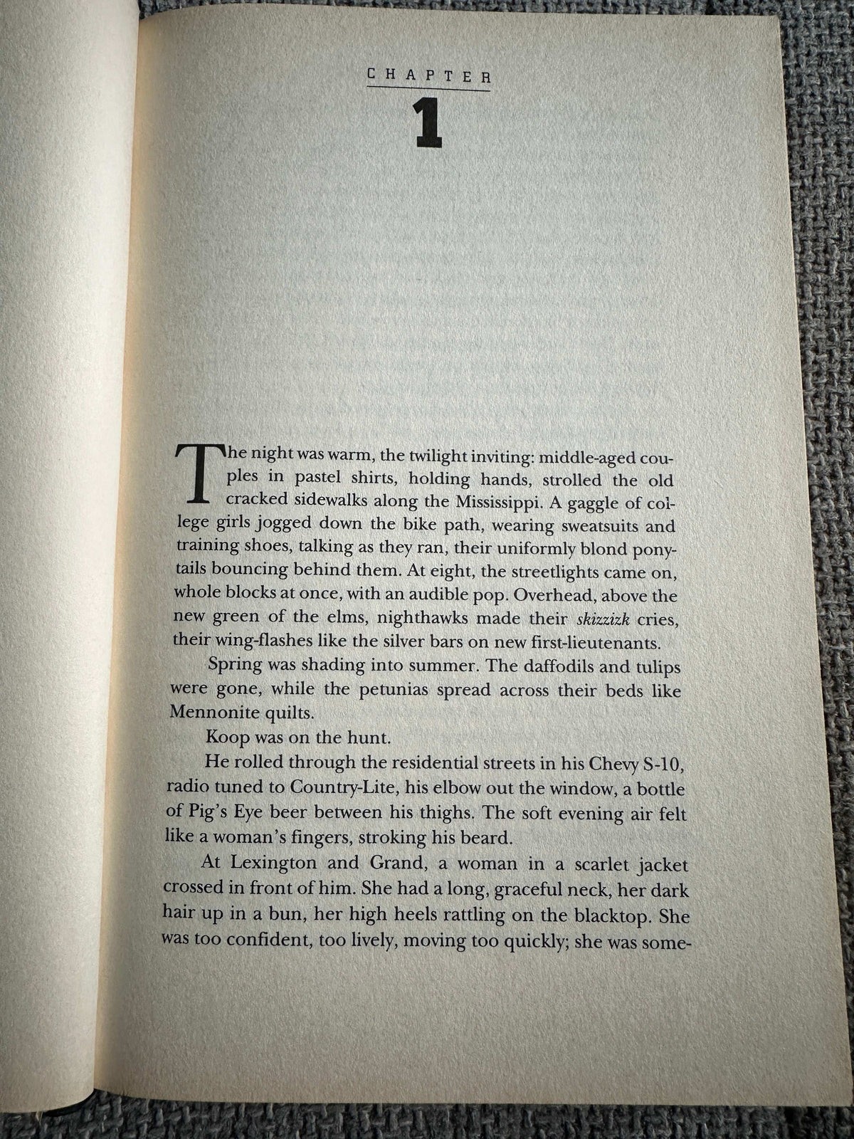 First edition of Night Prey John Sandford with chapter one text on an open page