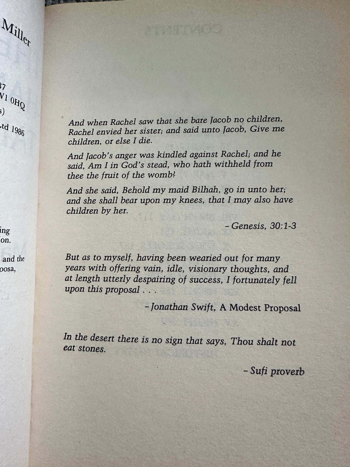 Open page of a Margaret Atwood first edition 1990 fiction book with excerpts from Genesis Jonathan Swift and a Sufi proverb