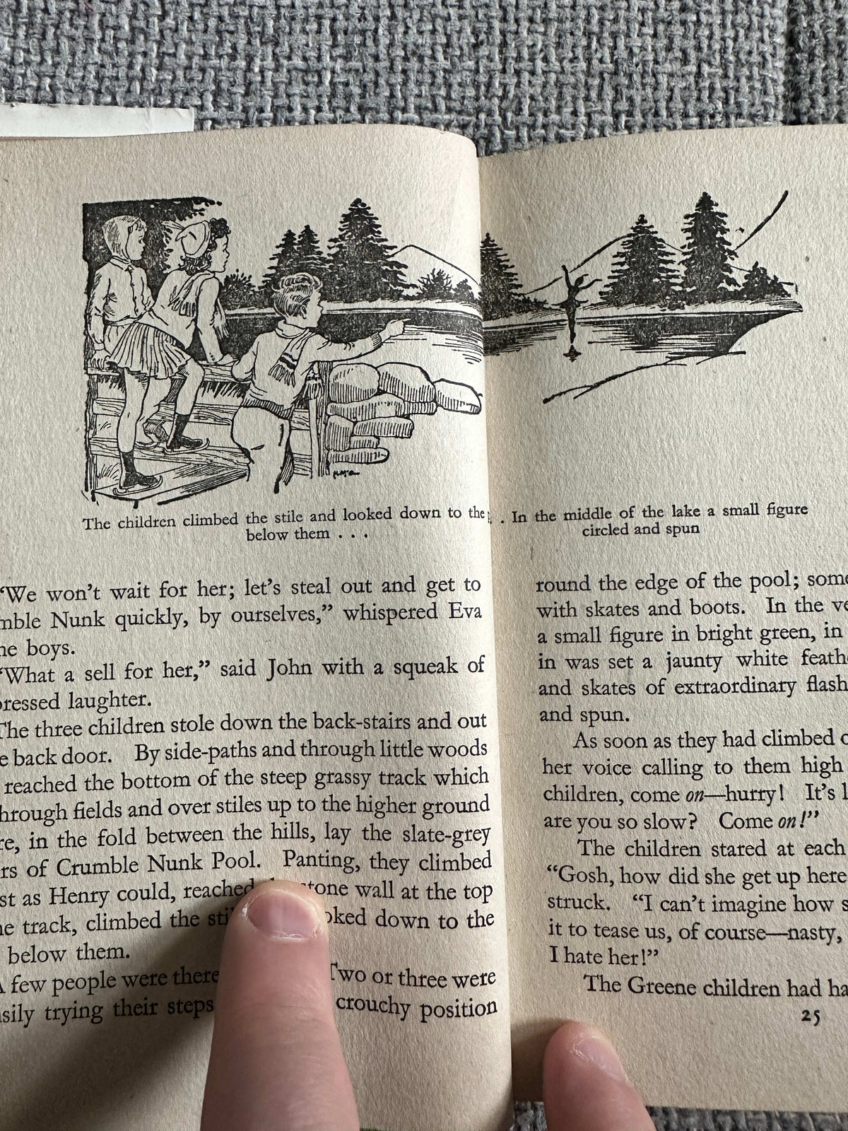 Children looking out from a book page depicting a scene from Miss Fairitch and the Little Greenes first edition