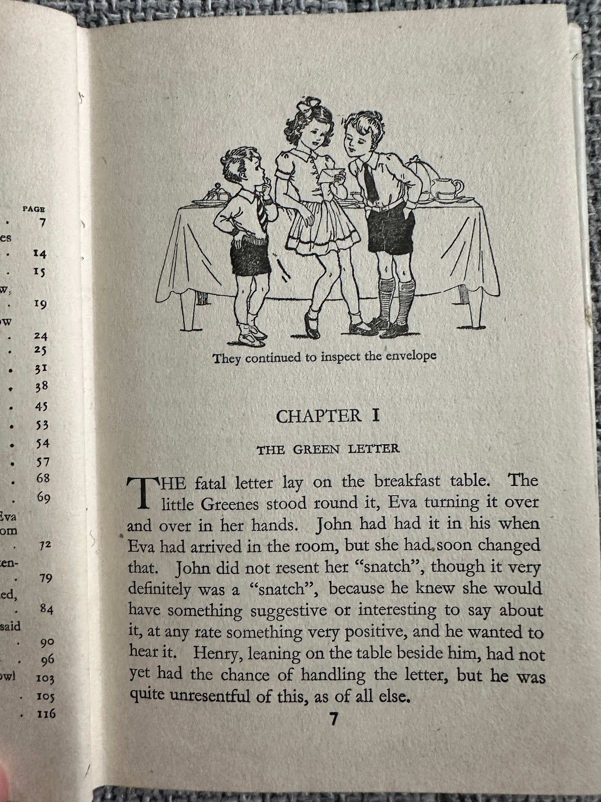 Children's book page from Miss Fairitch and the Little Greenes first edition showing characters inspecting an envelope