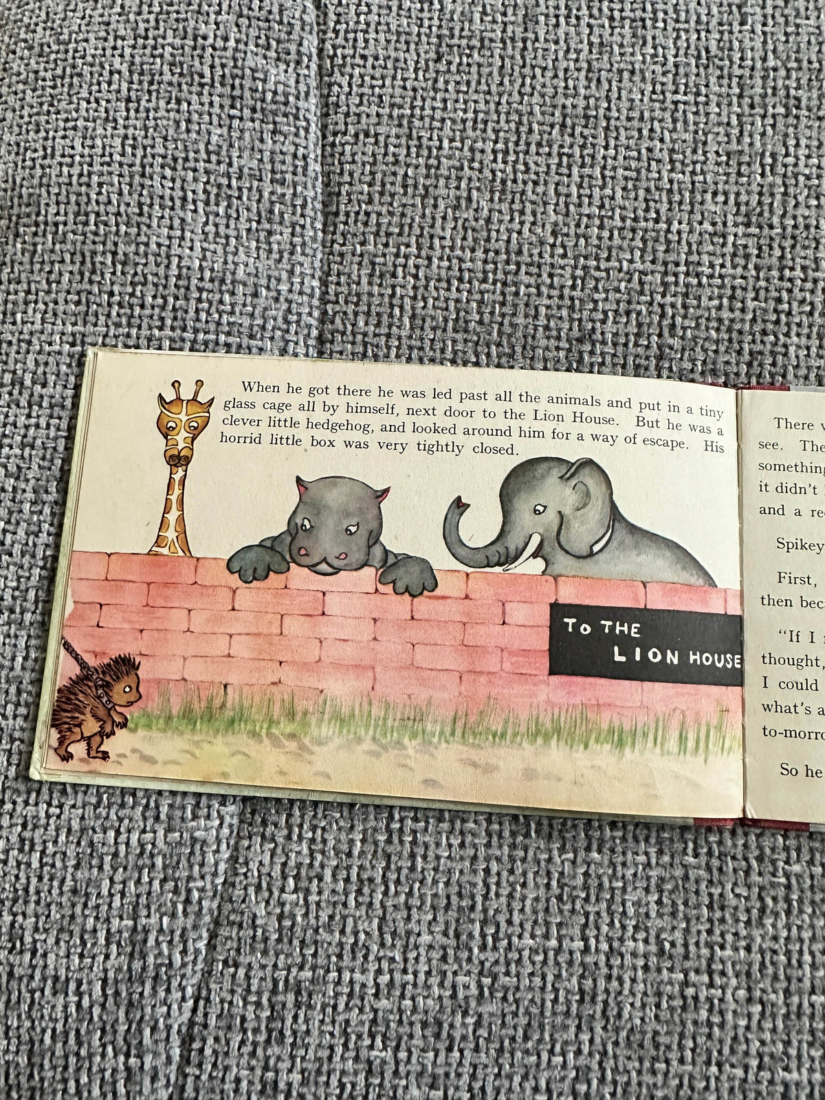 Something Like A Lion vintage children's book illustration with animals peeking over a wall