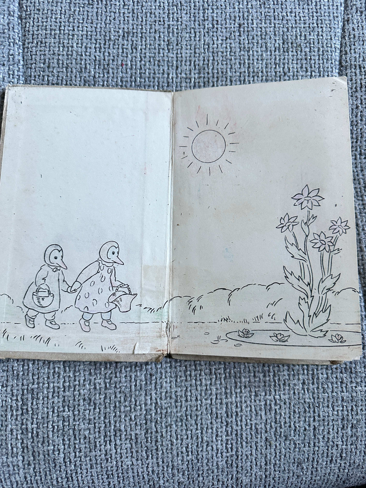 The First Day of the Holidays vintage children's book with illustrations of ducks in springtime scenery