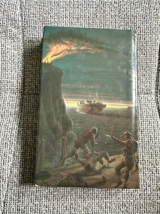 The Volunteers Douglas Reeman first edition book cover featuring a battle scene by the sea