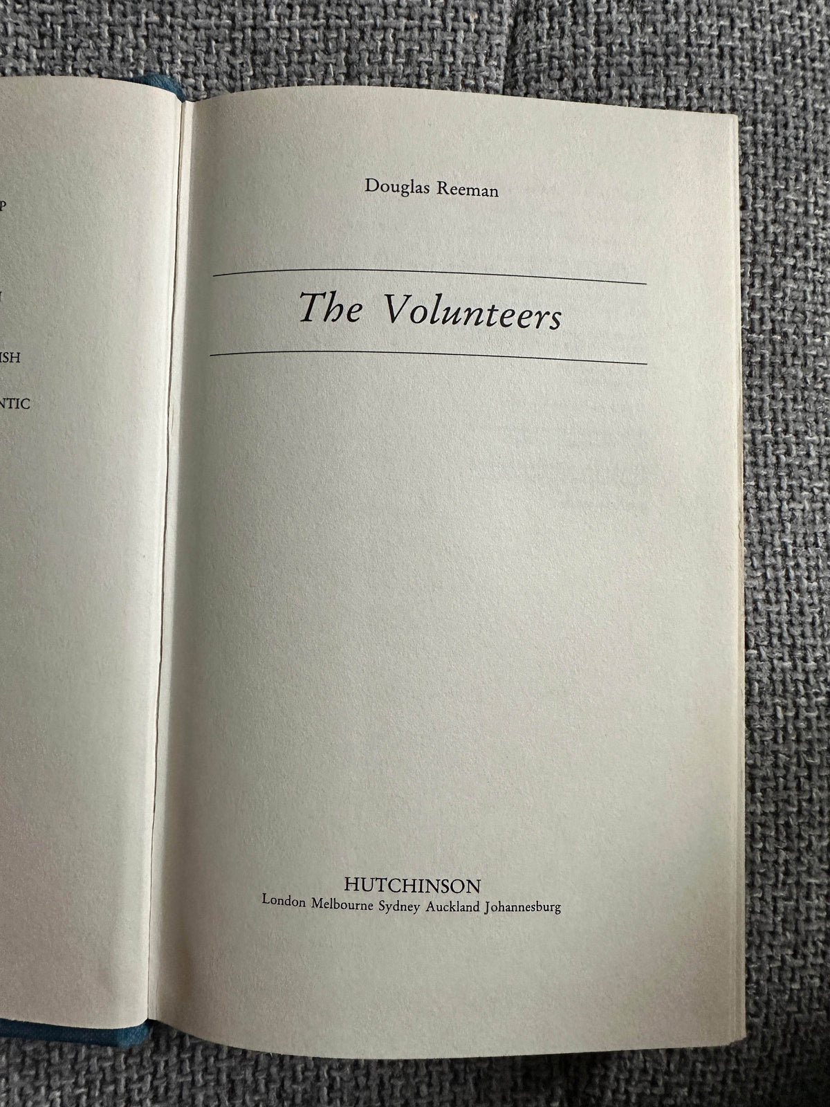 The Volunteers Douglas Reeman first edition title page showcasing author name and publisher details