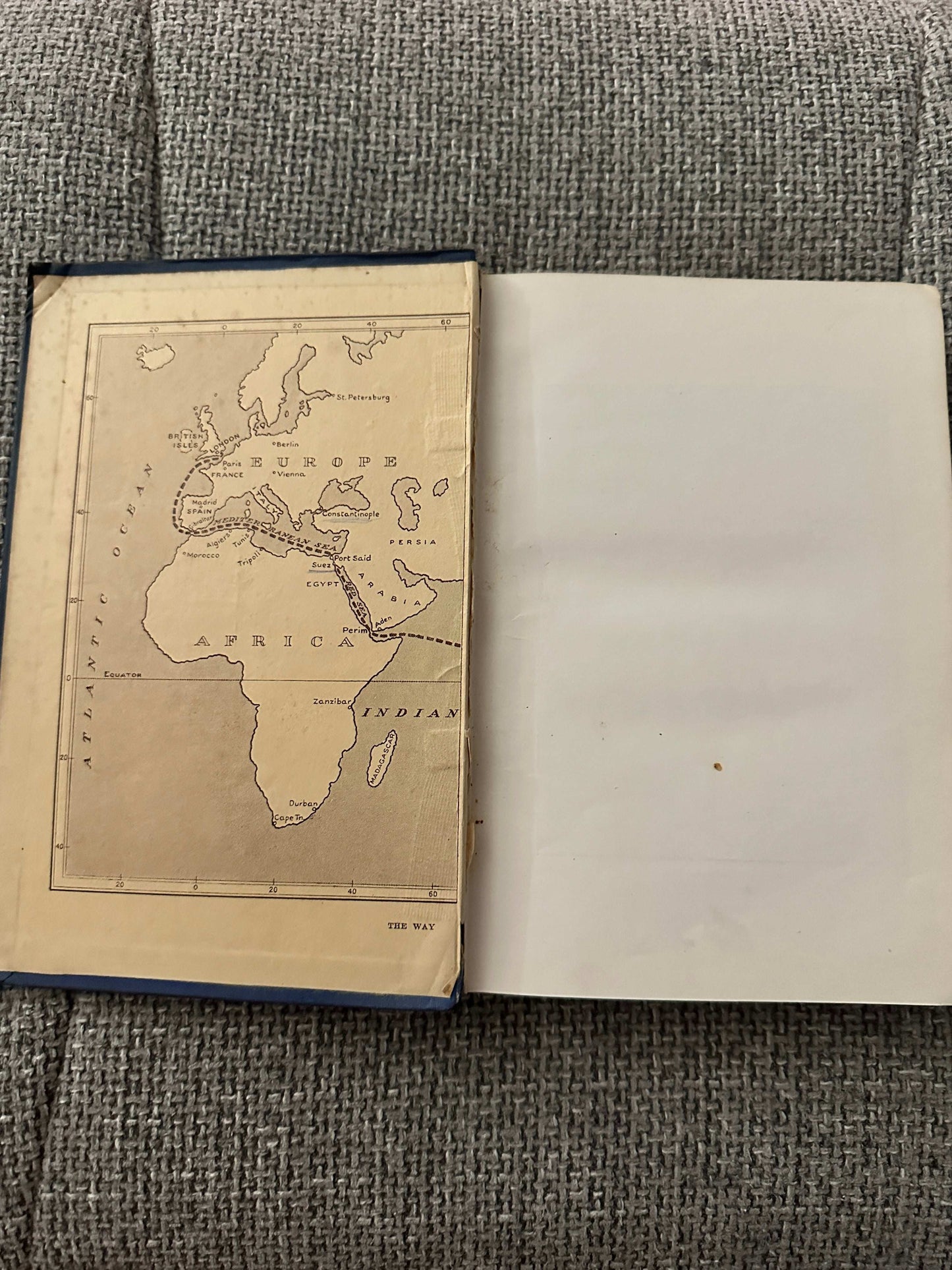 1914 Beside the Bamboo John MacGowan book interior showing map of Africa and blank page