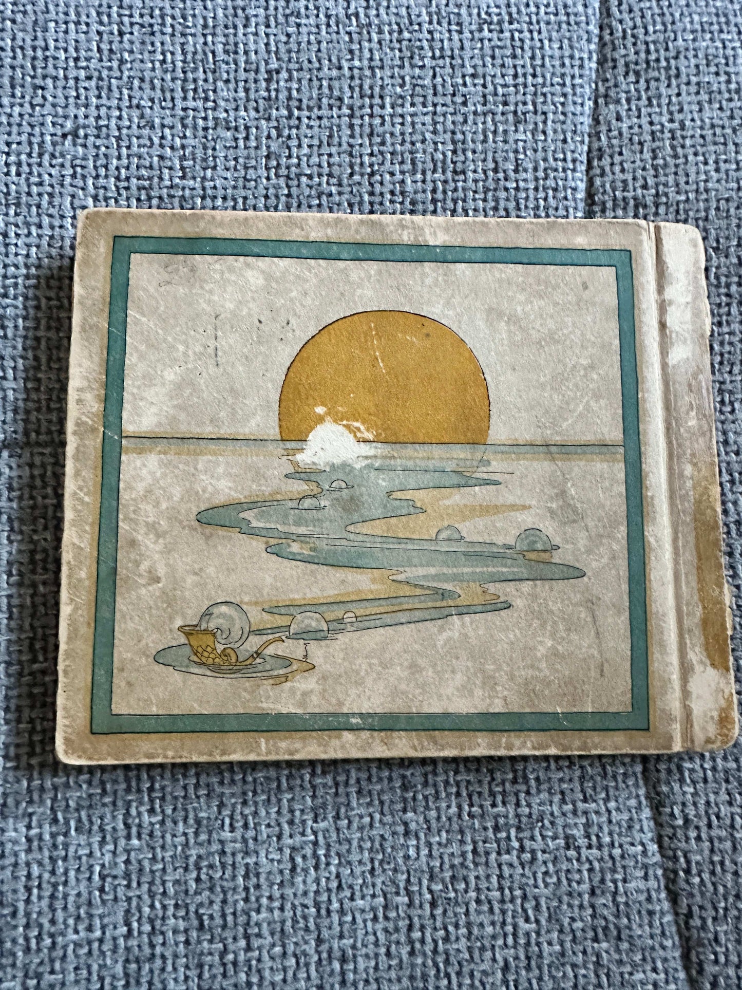 1917 Happy Go Lucky Bubble Book for sale with a vintage illustration of a sunset and serene landscape