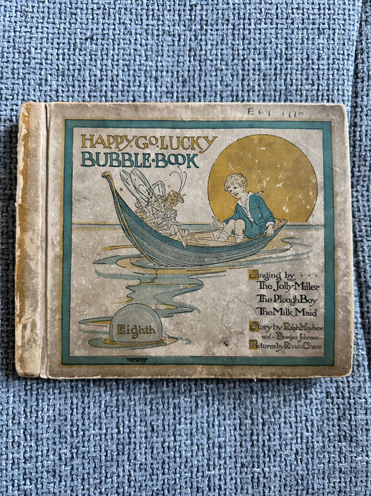 1917 Happy Go Lucky Bubble Book for sale featuring charming illustrations of children and fairies in a boat
