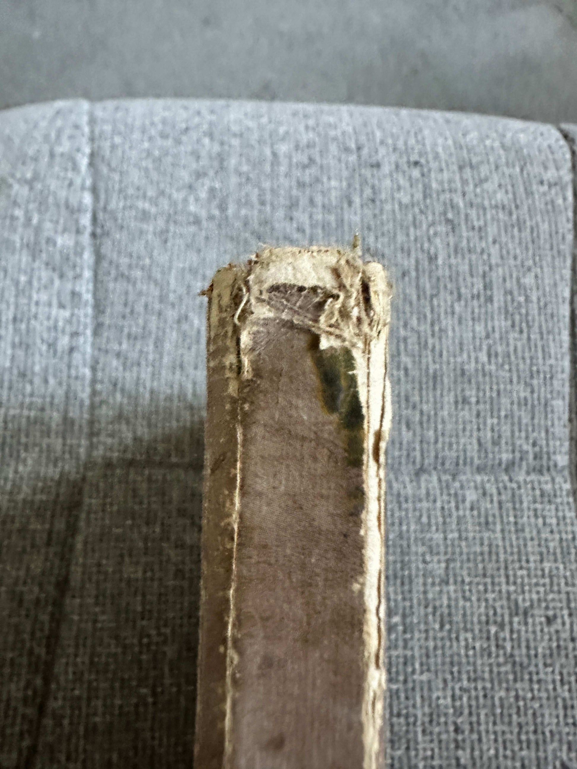 Spine view of 1933 The Fairy Ring hardback showing wear and tear on the edges