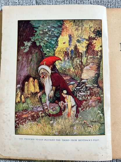 Illustration from 1933 The Fairy Ring hardback featuring a wizard and a young girl in a magical forest.