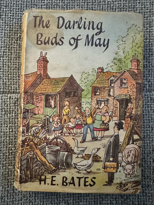 1958 The Darling Buds of May first edition book cover featuring colorful illustrations of rural life