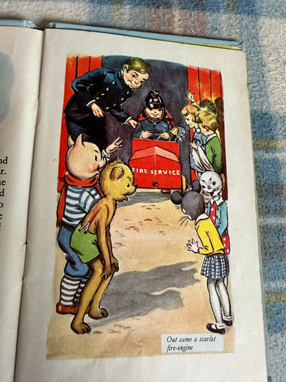 Illustration from the 1959 Bobby Bear The Fireman book featuring children and animals at a fire service scene