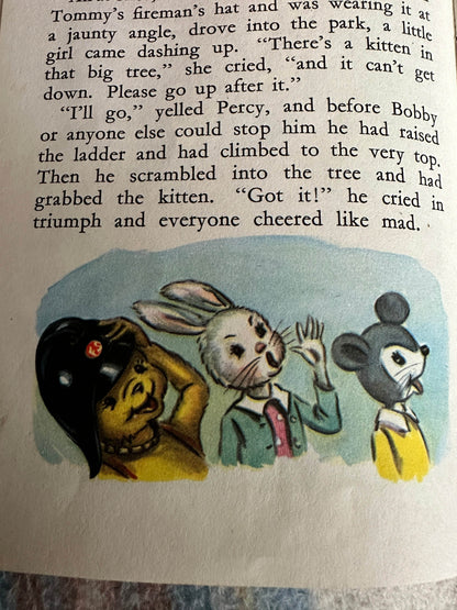 Illustration from 1959 Bobby Bear The Fireman book showing Bobby and friends rescuing a kitten from a tree