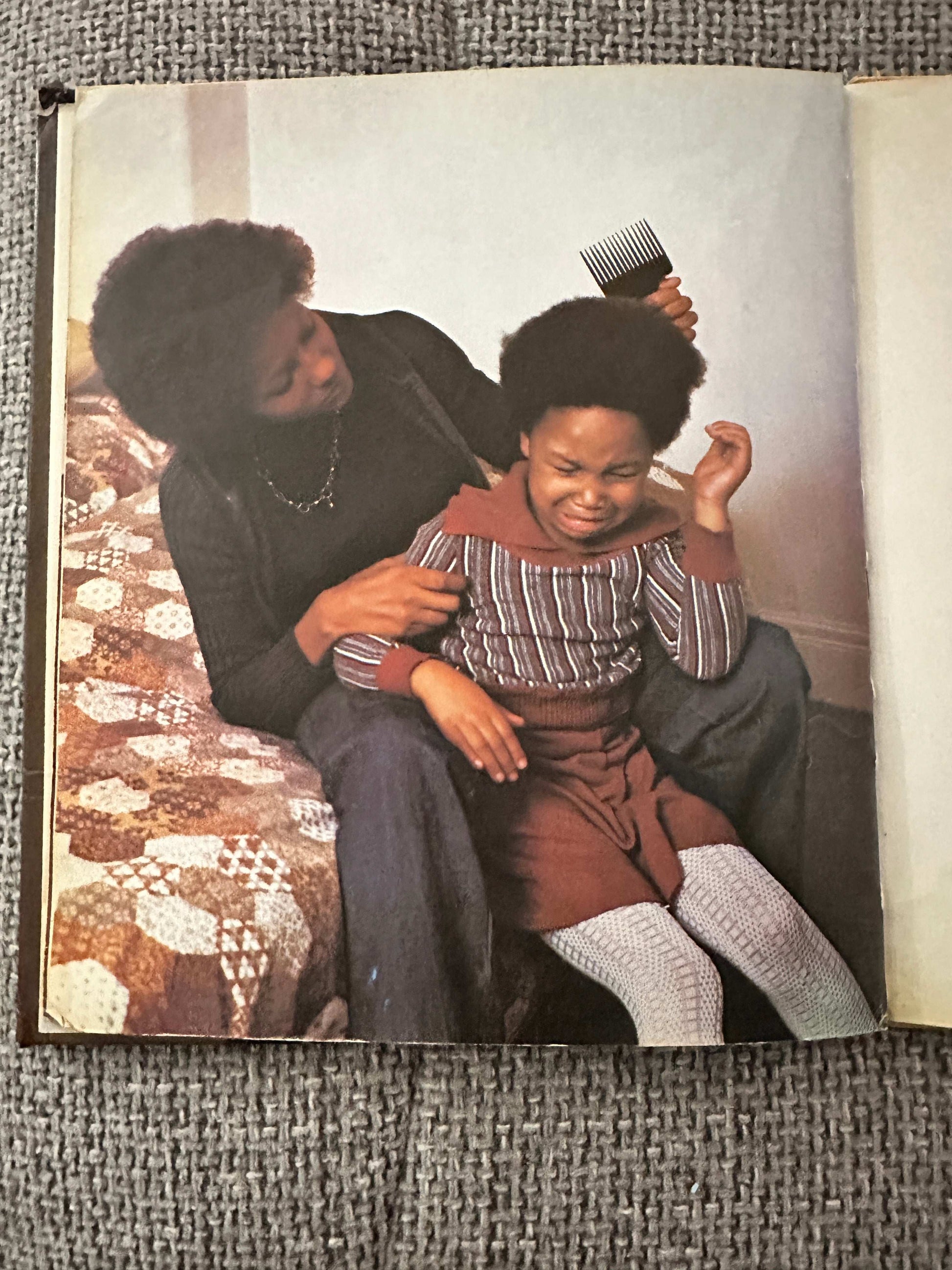 1978 Hamish Hamilton collectible book featuring a mother and daughter getting ready with a comb