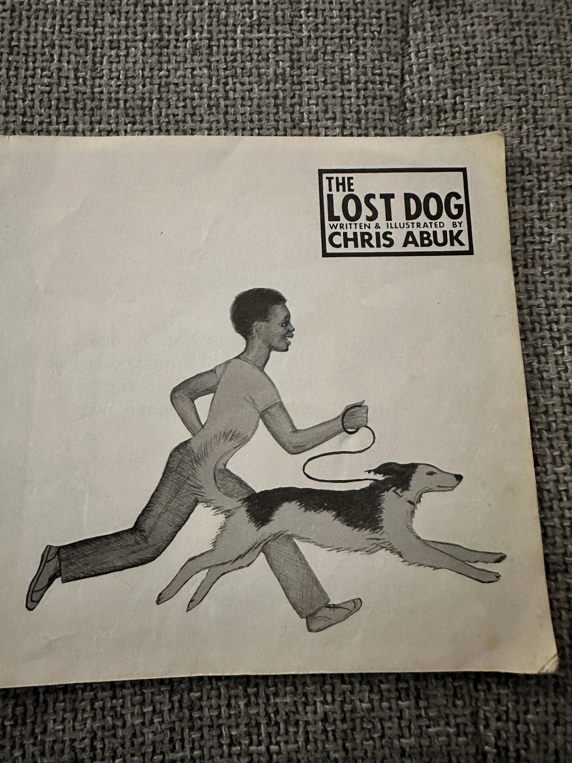 1979 The Lost Dog Chris Abuk first edition cover featuring a child running with a dog