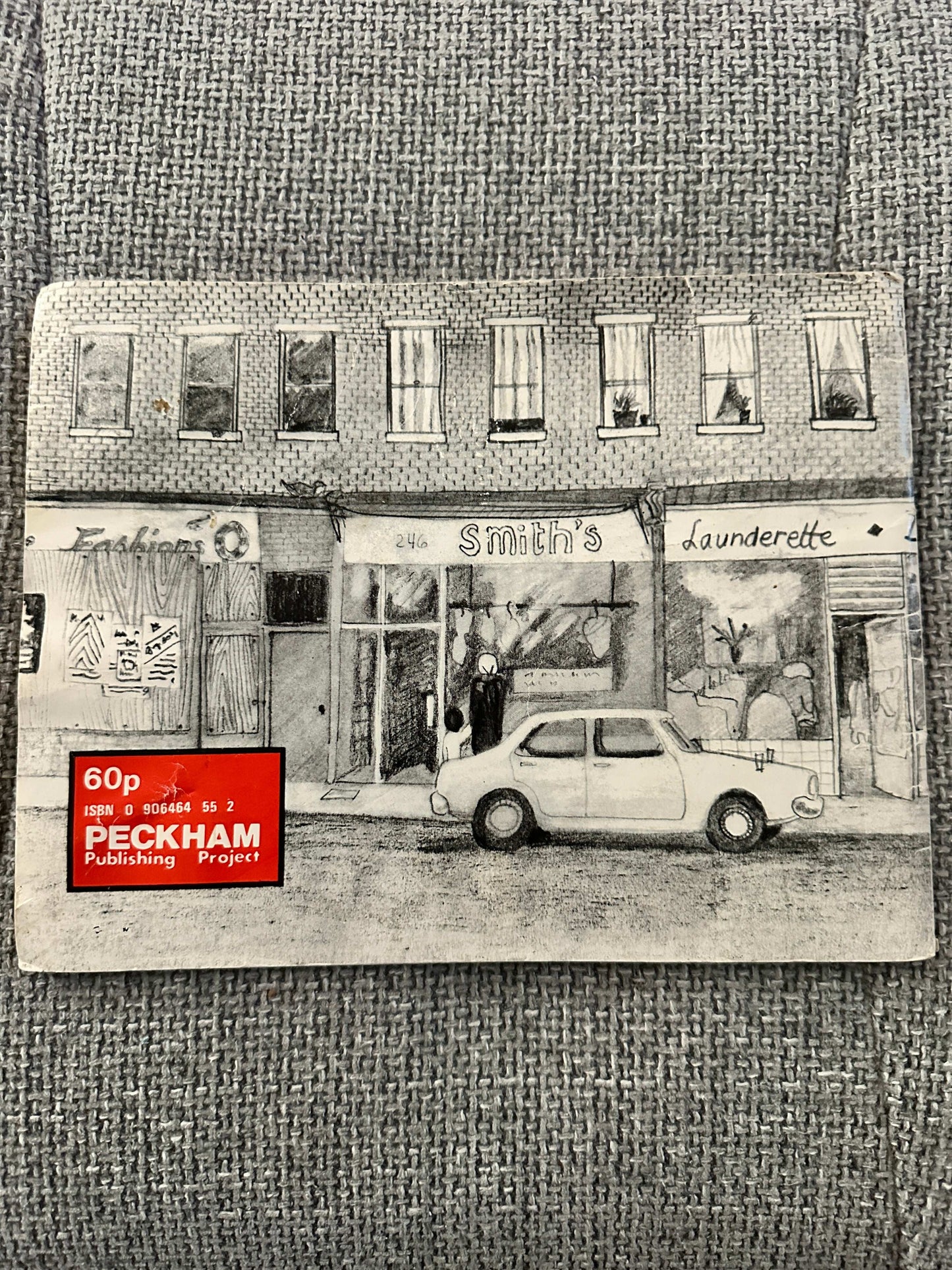 Cover of 1979 The Lost Dog Chris Abuk first edition featuring a laundrette scene in Peckham