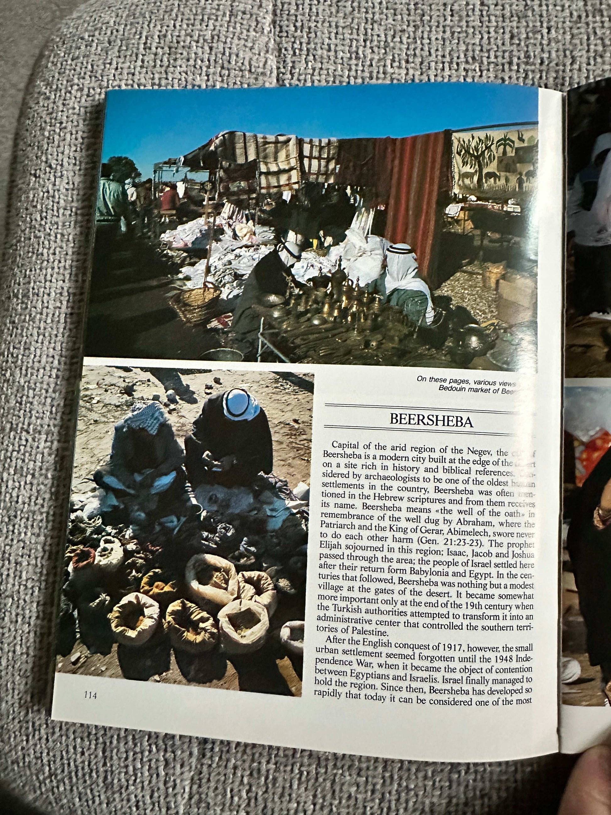 1992 Israel travel book page featuring market scenes and historical information about Beersheba