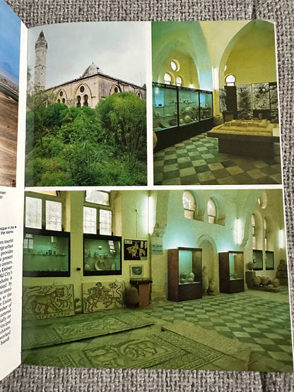 1992 Israel travel book showcasing historical sites and museum exhibits with informative displays