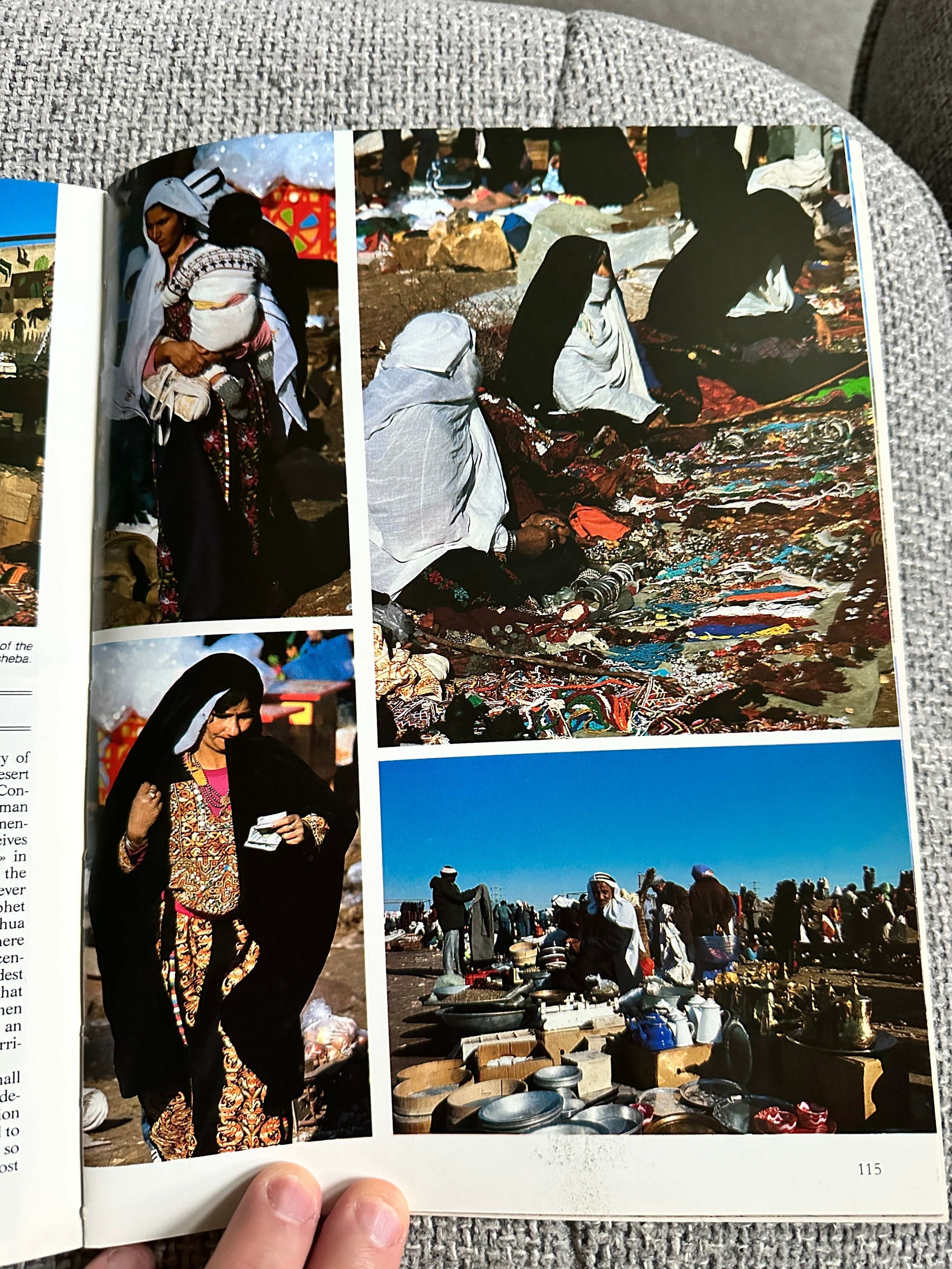 Inside pages of a 1992 Israel travel book featuring local markets and cultural scenes