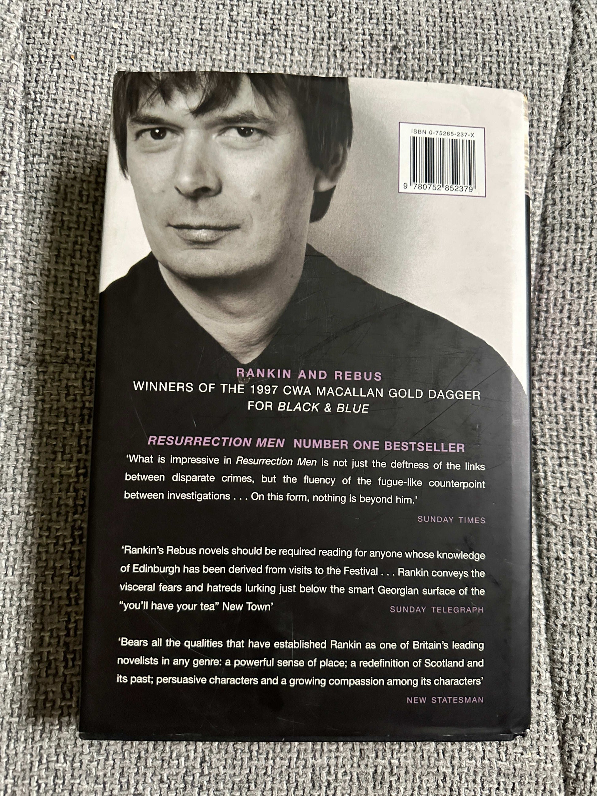 2002 signed Ian Rankin Beggars Banquet book cover featuring endorsement quotes and author details