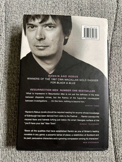 2002 signed Ian Rankin Beggars Banquet book cover featuring endorsement quotes and author details