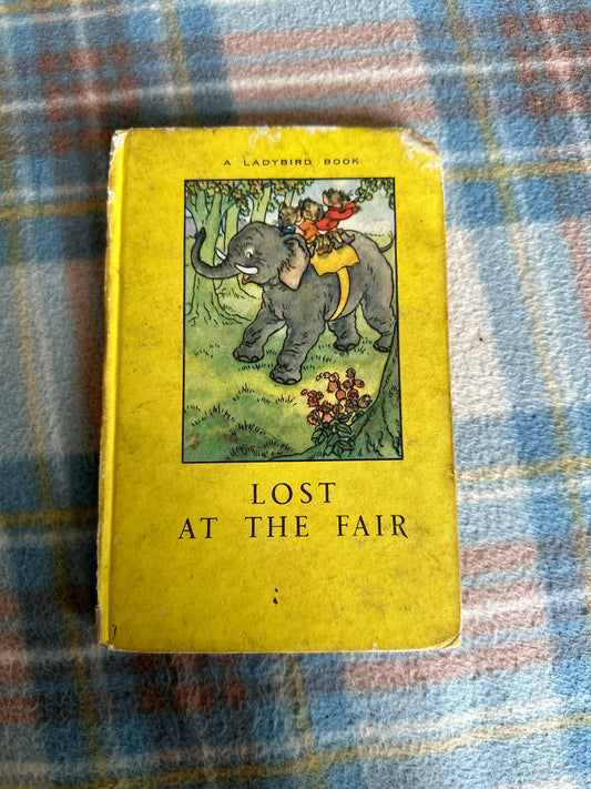1960’s Lost At The Fair (Series 401 Ladybird) verses by Walter Perring(Illustrated by Angusine MacGregor) Wills & Hepworth