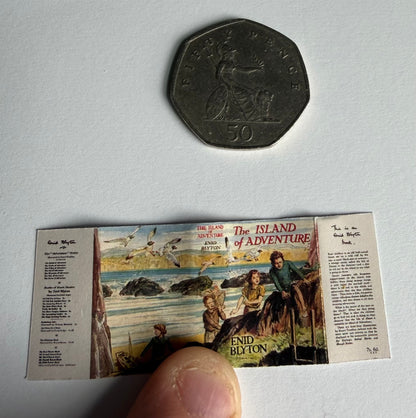 The Island Of Adventure 1:12 scale 2x3 miniature. Detachable dust jacket. Book opens.