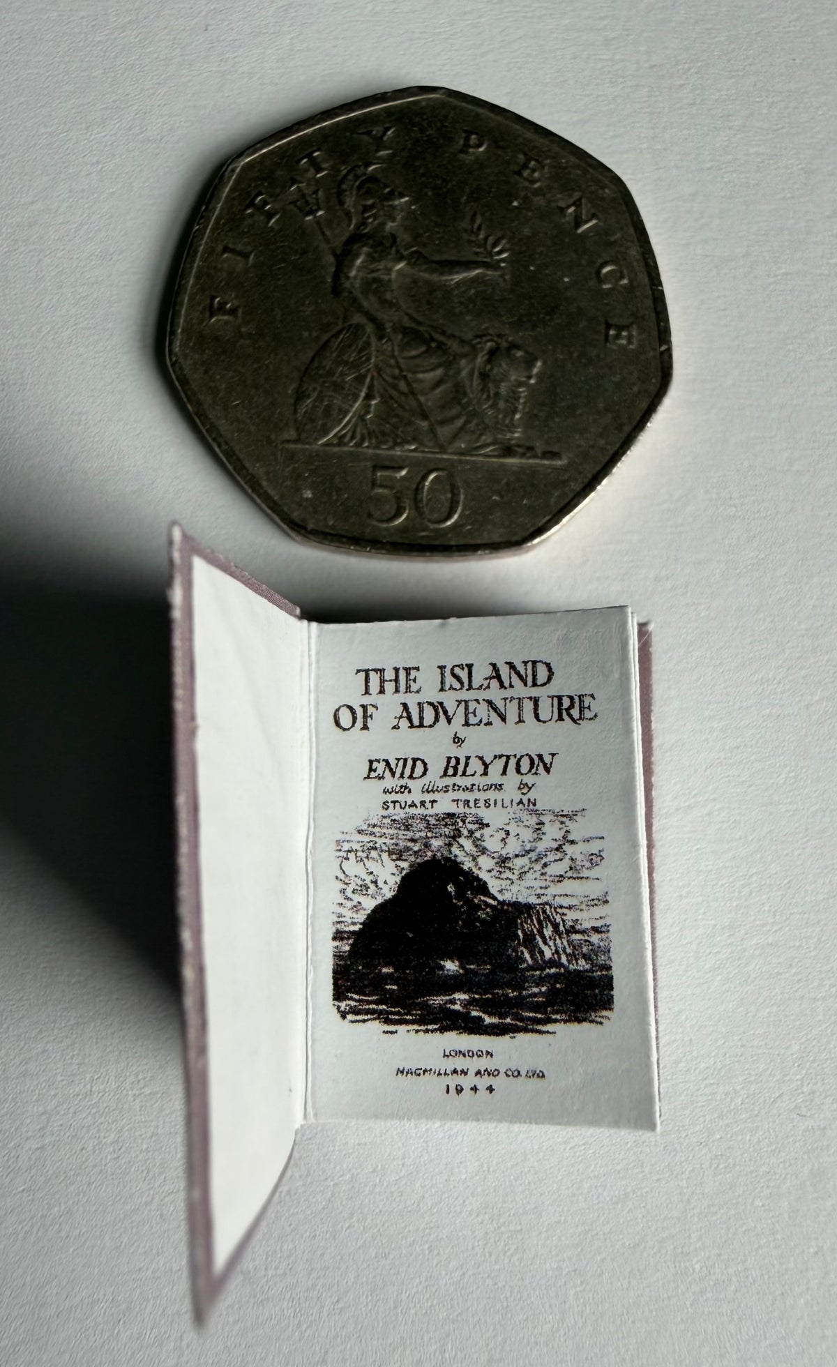 The Island Of Adventure 1:12 scale 2x3 miniature. Detachable dust jacket. Book opens.