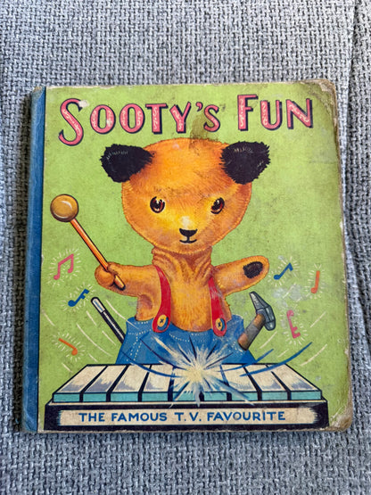 1960c Sooty’s Fun - Purnell & Sons Ltd worn boards.