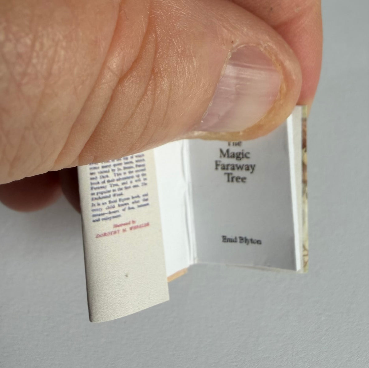 The Magic Faraway Tree 1:12 scale 2x3 detachable dust jacket opening book. Not full books, not suitable for children