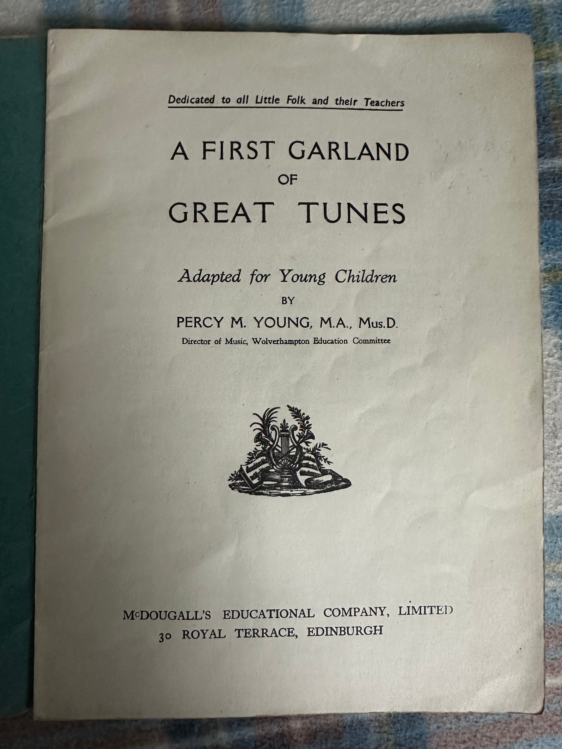 A First Garland of Great Tunes Percy M Young book cover, featuring a classic design for young children
