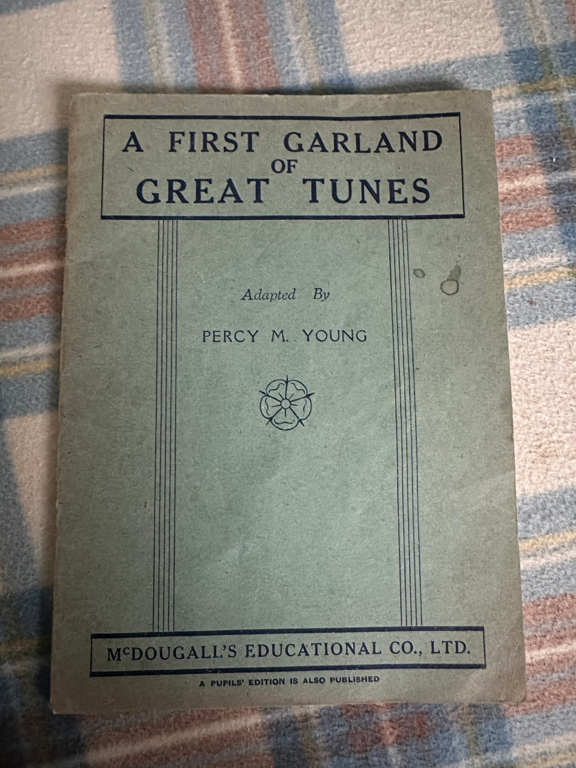 A First Garland of Great Tunes Percy M Young book cover with green background and simple design