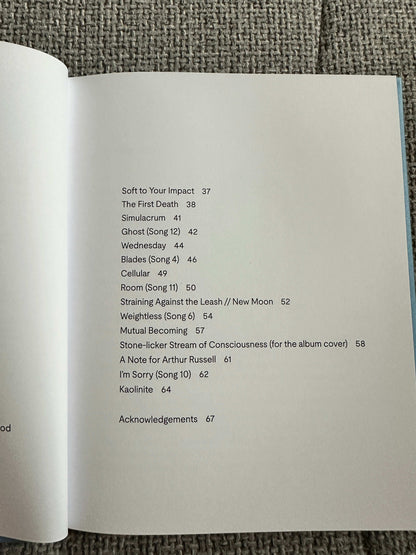 Interior page featuring the contents of The Magic Border signed poetry book with titles and page numbers