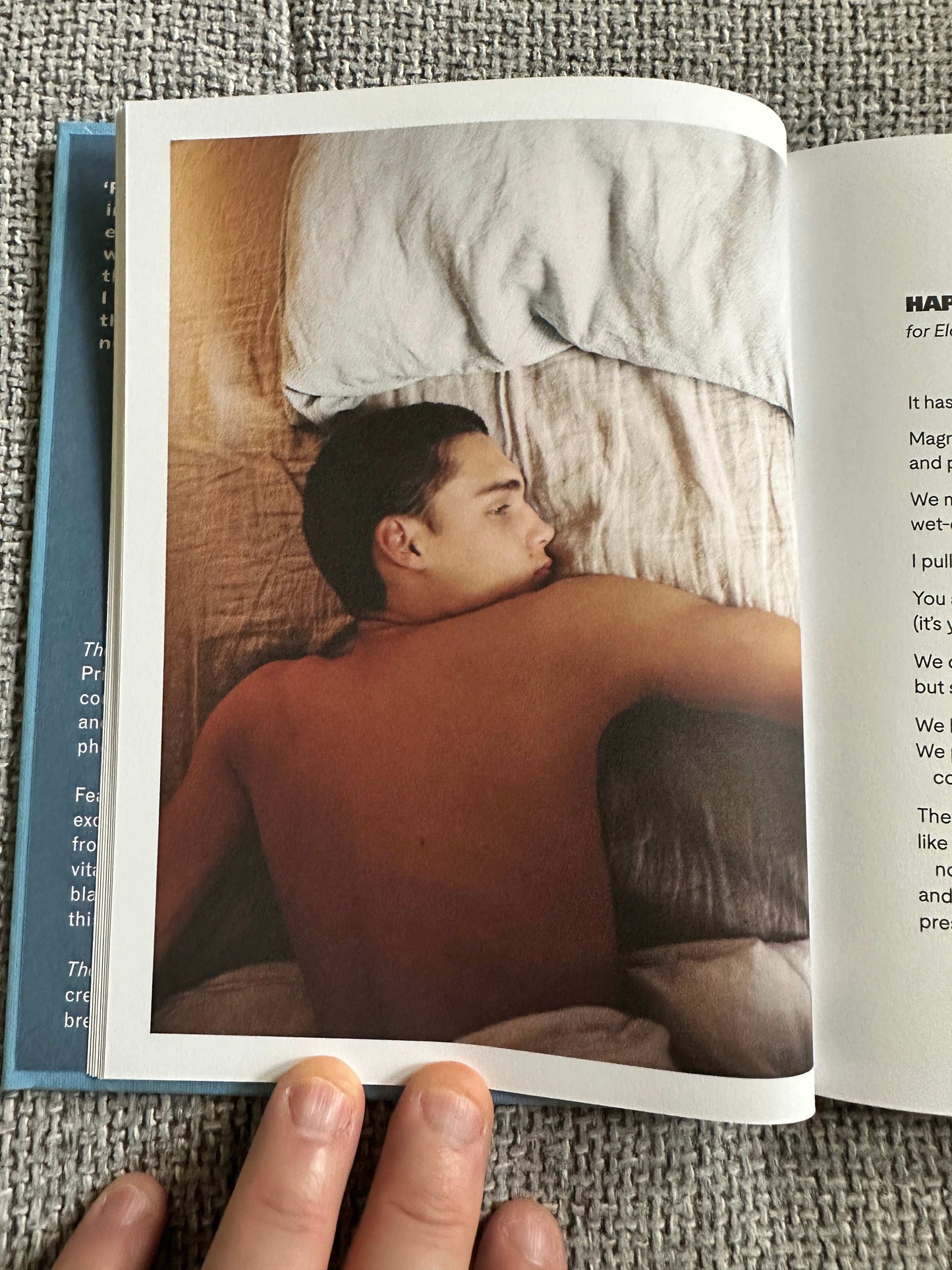 The Magic Border signed poetry book featuring a photograph of a person resting on a bed