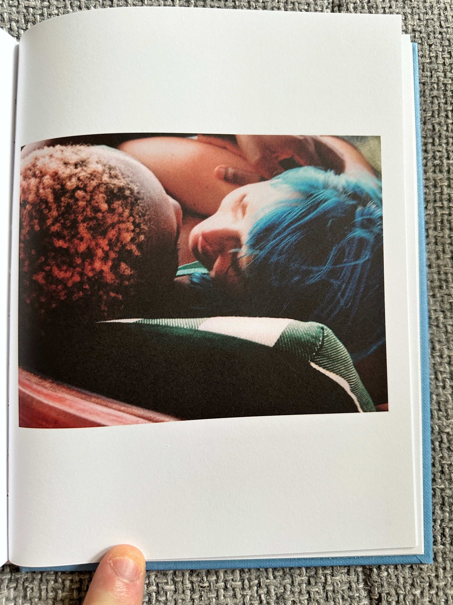 A tender moment captured within The Magic Border signed poetry book showcasing intimate imagery