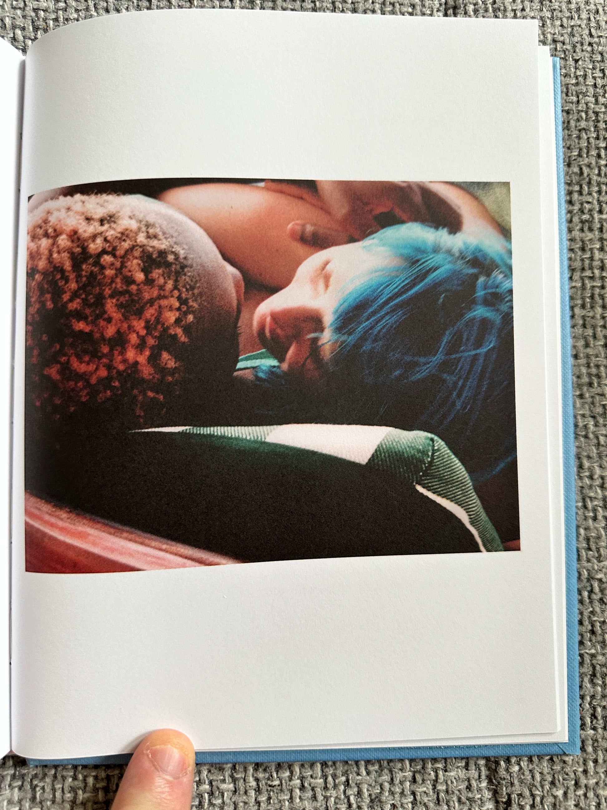 A tender moment captured within The Magic Border signed poetry book showcasing intimate imagery