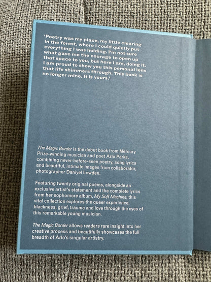The Magic Border signed poetry book by Arlo Parks featuring intimate lyrics and personal insights into the musician's artistry