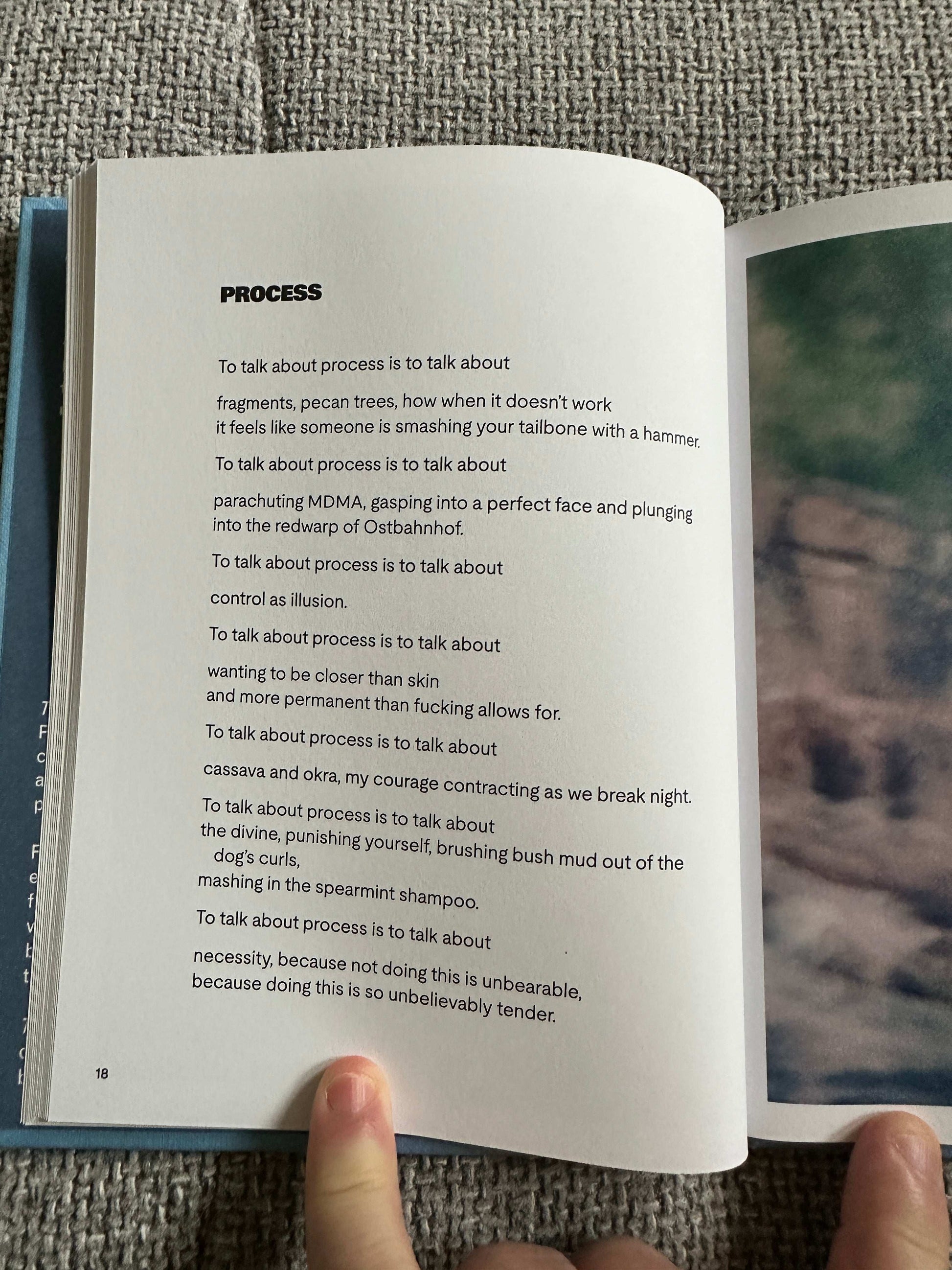 The Magic Border signed poetry book open to a page discussing the creative process with handwritten notes
