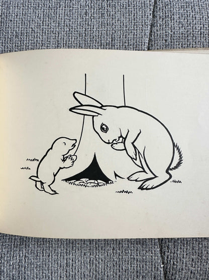 Illustration from Billy Bobtail first edition for sale, featuring a rabbit and a small animal near a tree