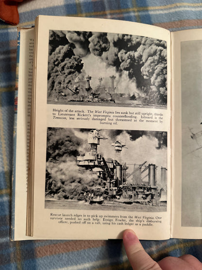 Inside pages of Day of Infamy first edition depicting wartime naval scenes and dramatic imagery