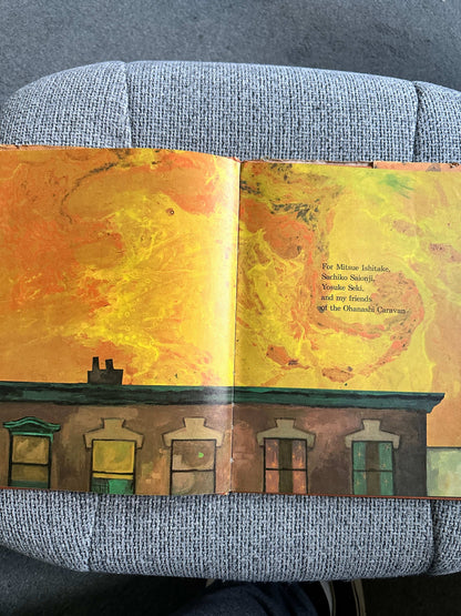 Inside page of Dreams Ezra Jack Keats first edition showing vibrant orange and yellow artwork